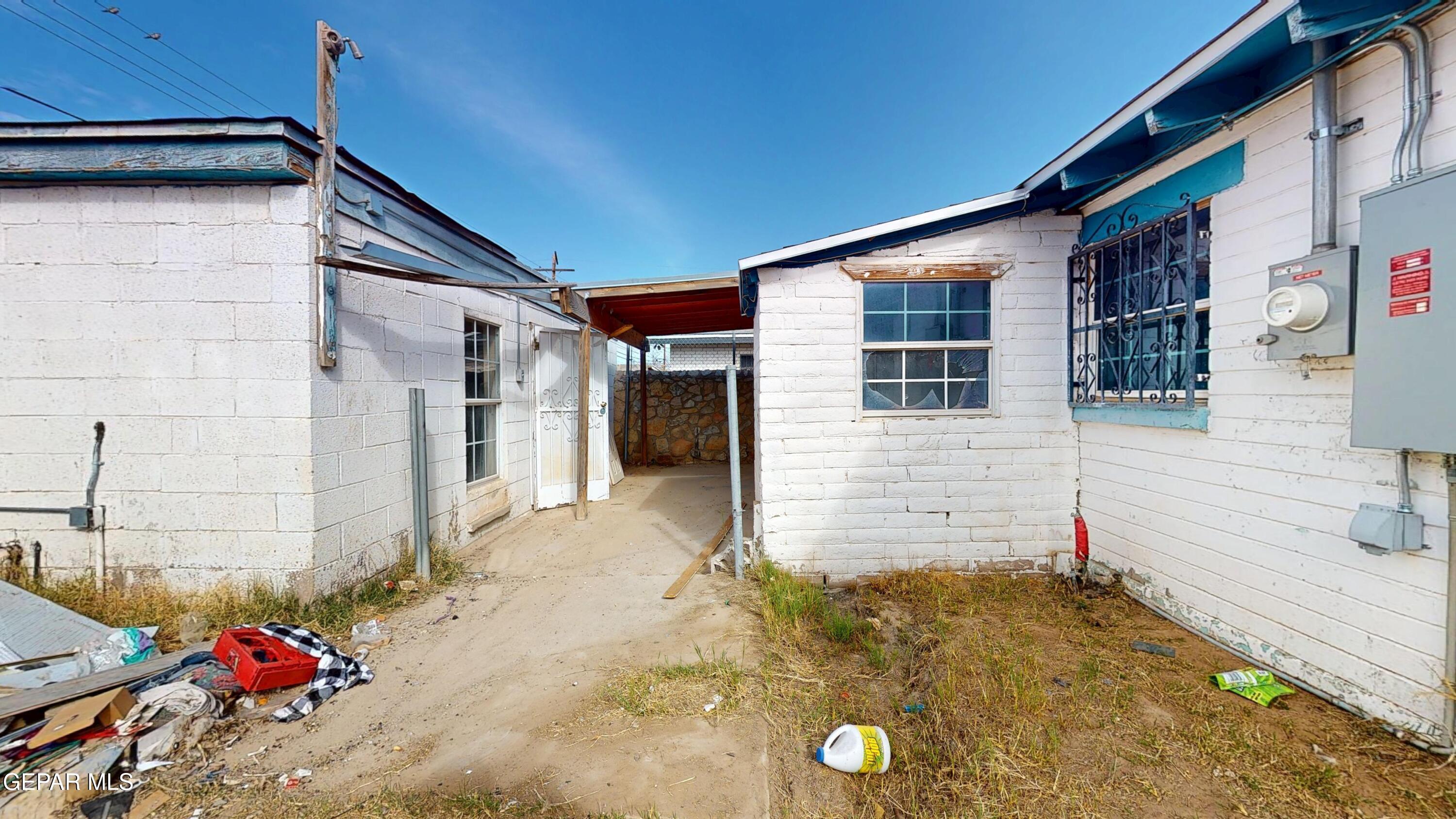 135 Baywood Road El Paso, TX 79915 - Photo 39 of 43 a front view of a house with a yard