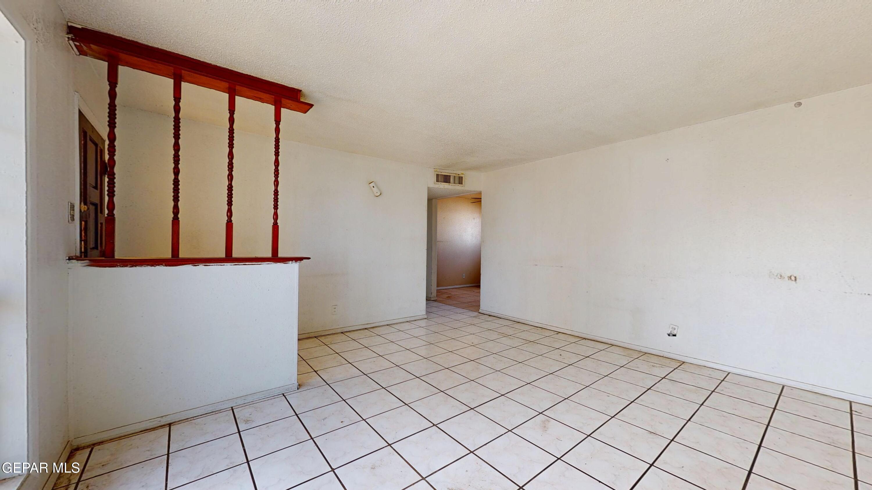 135 Baywood Road El Paso, TX 79915 - Photo 4 of 43 a view of an empty room