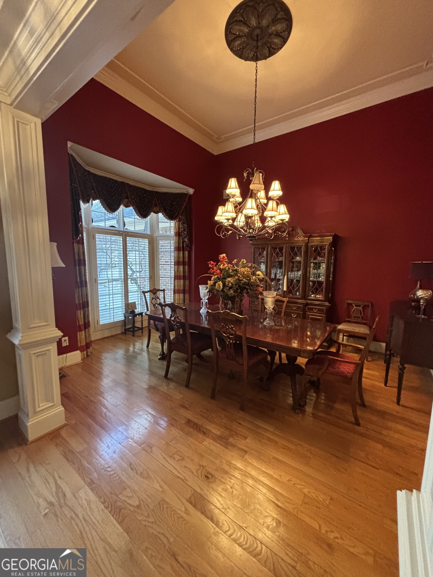 74 Waterford Path Hiram, GA 30141 - Photo 15 of 43 a view of a dining room with furniture and chandelier