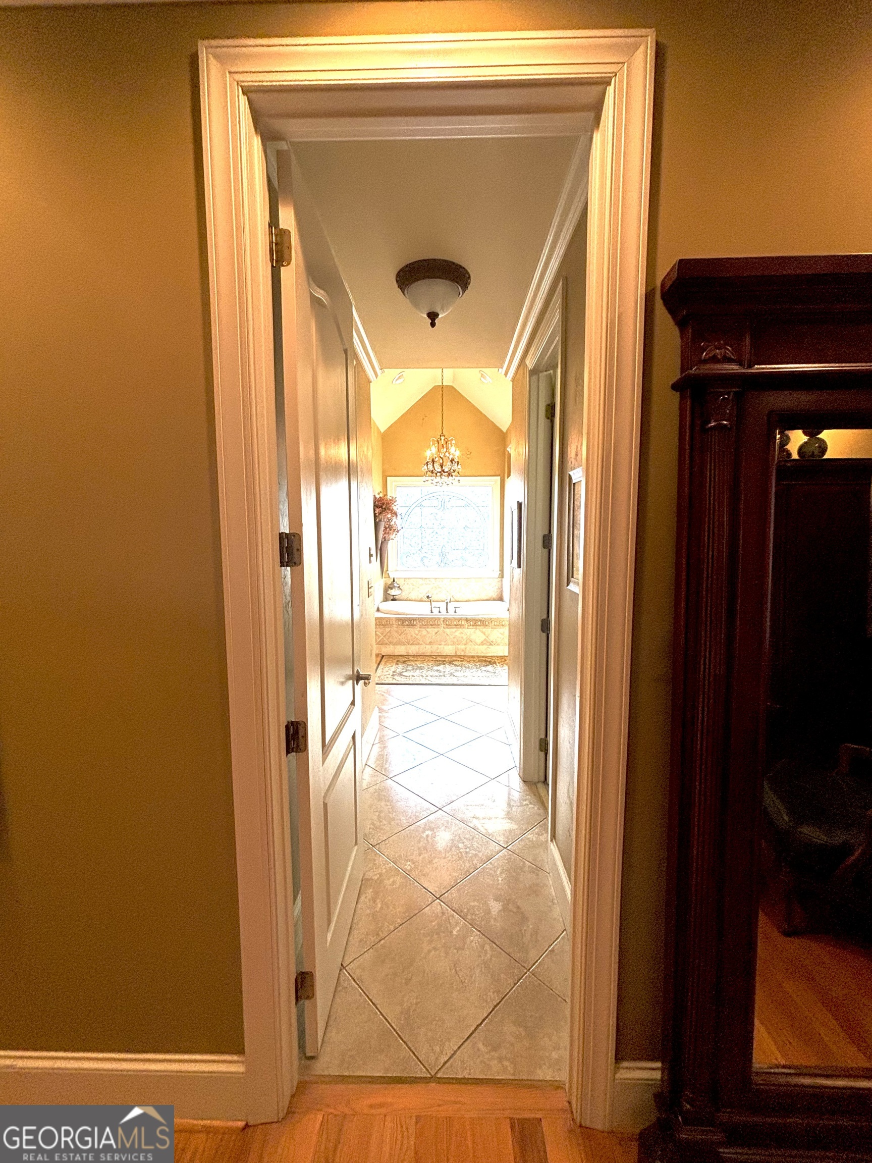 74 Waterford Path Hiram, GA 30141 - Photo 18 of 43 a view of a hallway with wooden floor and a door