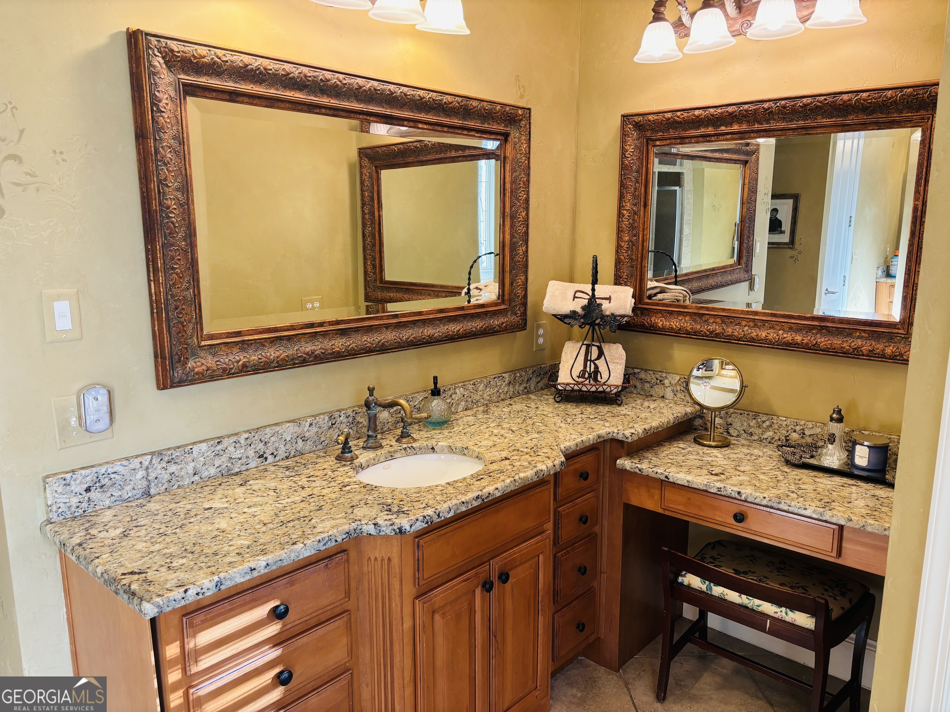 74 Waterford Path Hiram, GA 30141 - Photo 21 of 43 a bathroom with a granite countertop sink and a mirror