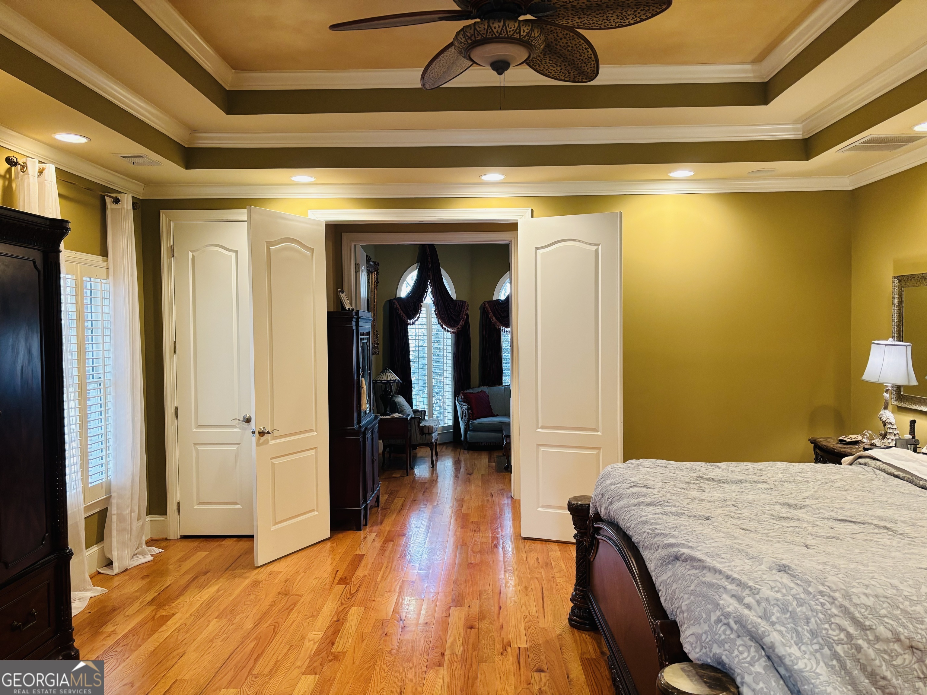 74 Waterford Path Hiram, GA 30141 - Photo 26 of 43 a bedroom with a bed and a mirror