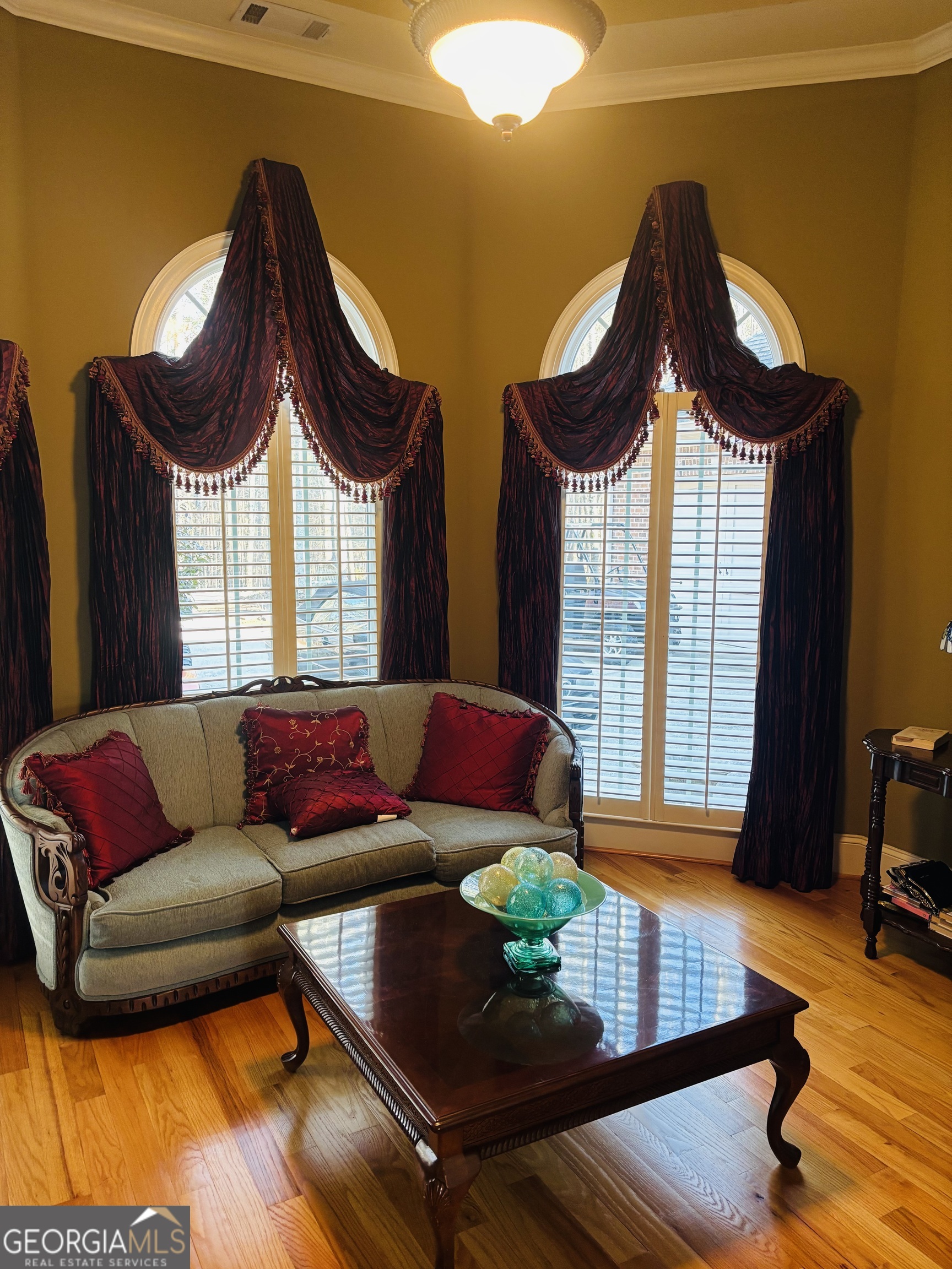 74 Waterford Path Hiram, GA 30141 - Photo 27 of 43 a living room with furniture and a wooden floor