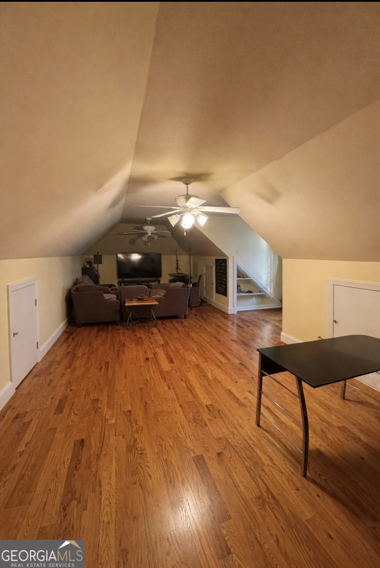 74 Waterford Path Hiram, GA 30141 - Photo 34 of 43 a room with lots of furniture and wooden floor