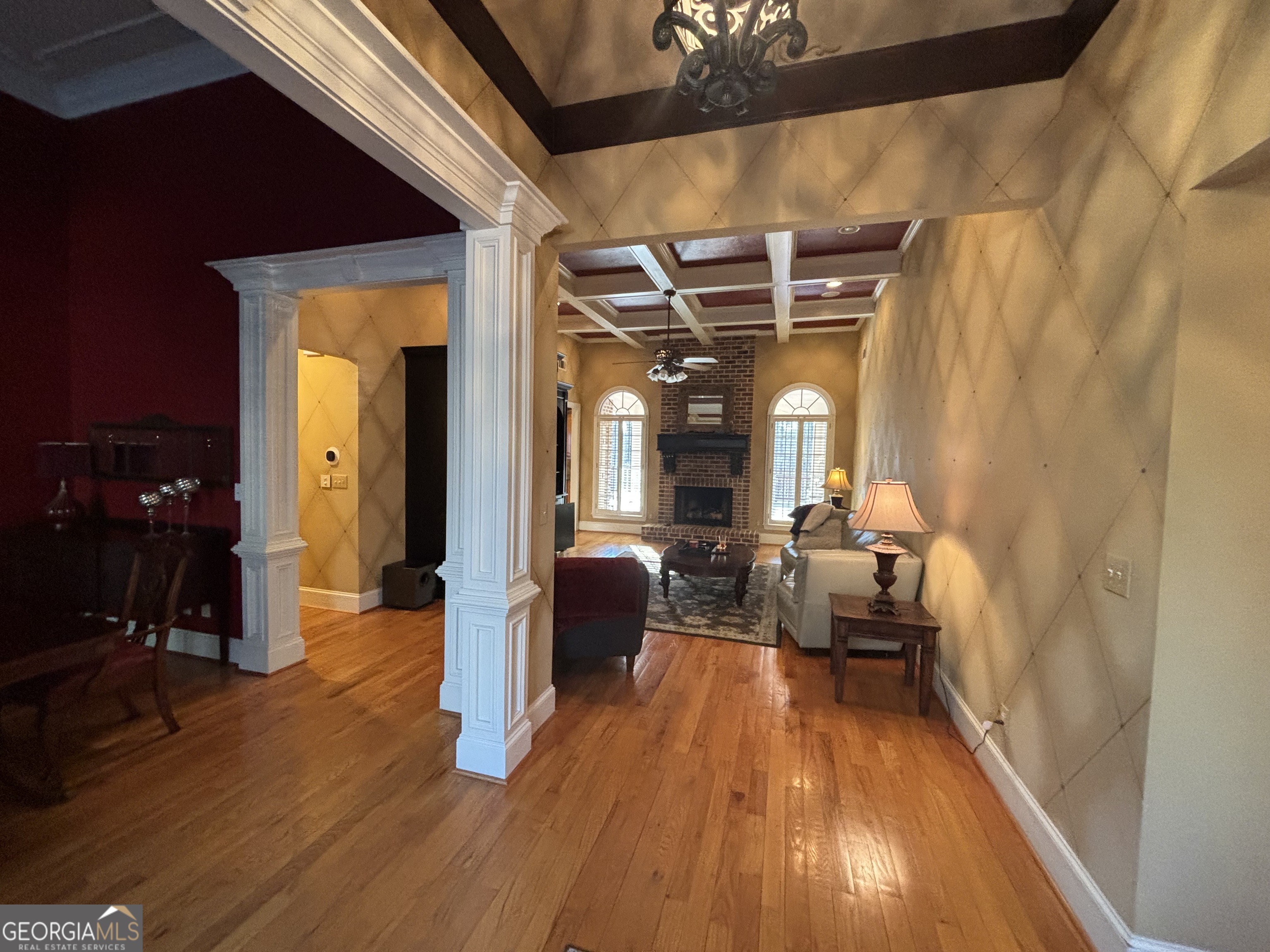 74 Waterford Path Hiram, GA 30141 - Photo 10 of 43 a hallway with wooden floor and furniture