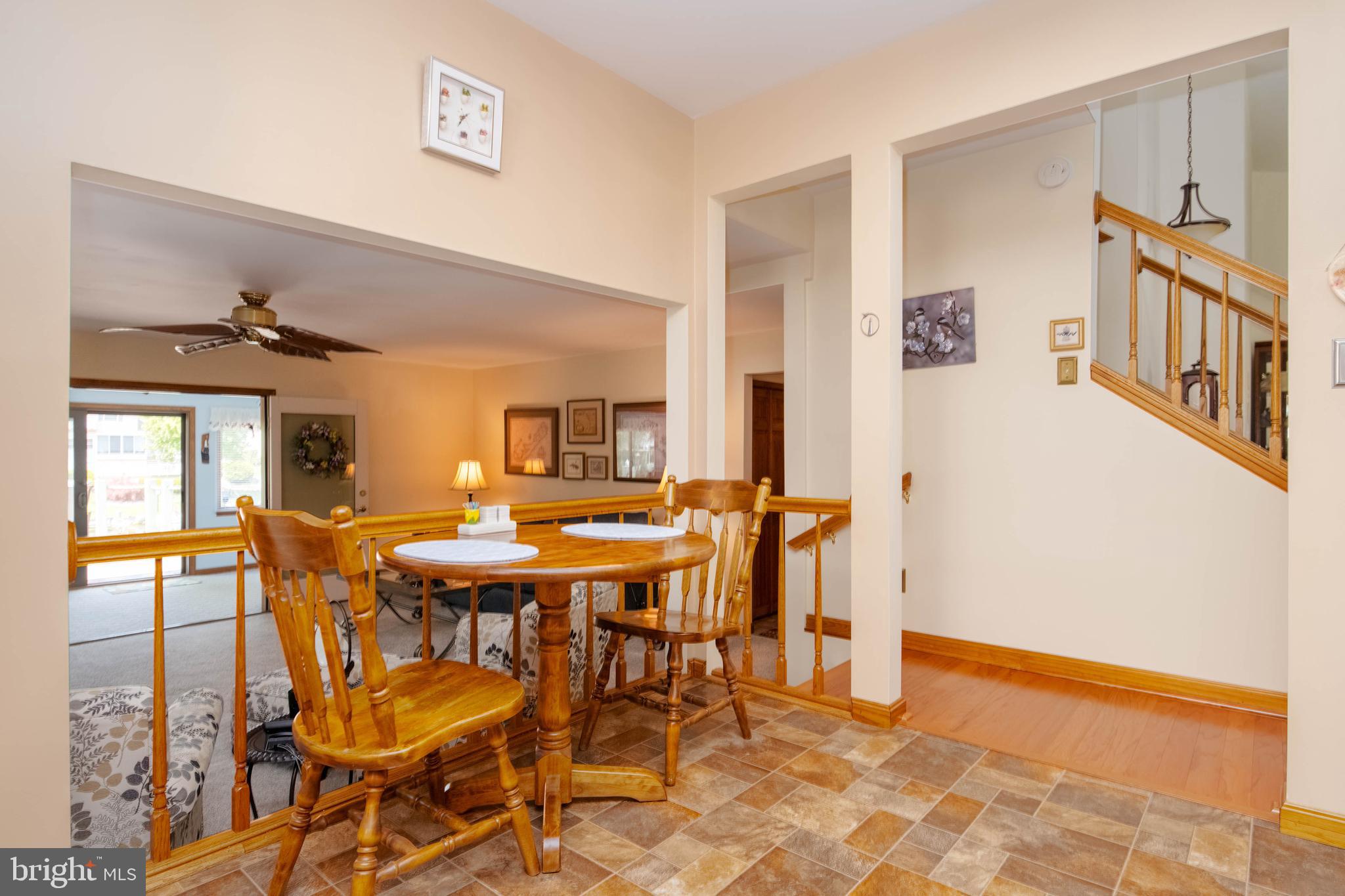 110 Shell Cove Court Joppa, MD 21085 - Photo 13 of 104 a view of a dining room with furniture and a window