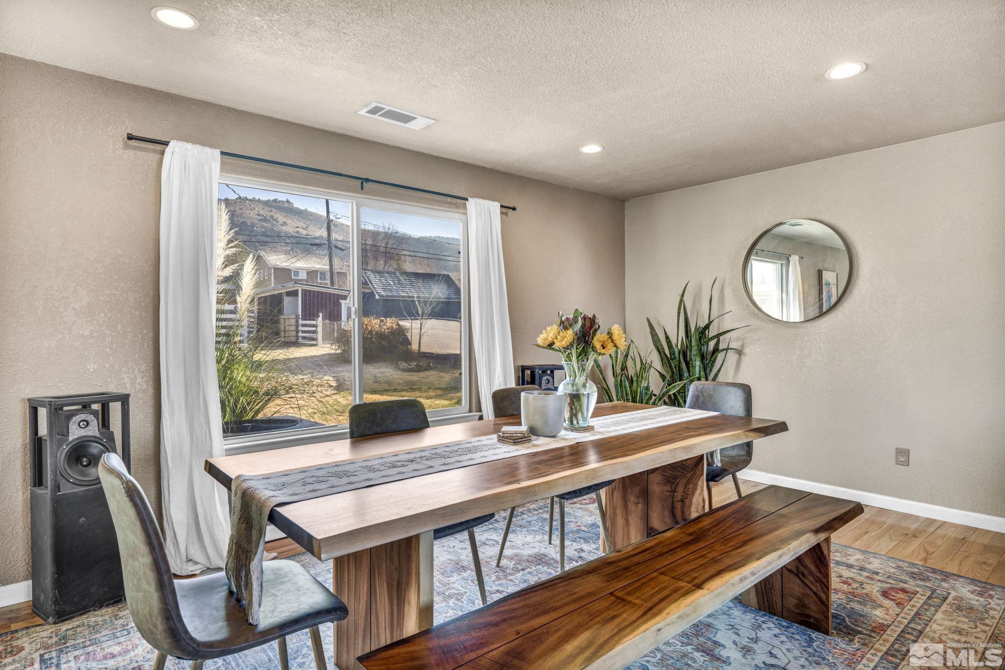 14660 Chamy Drive Reno, NV 89521 - Photo 11 of 38 a dining room with furniture and window