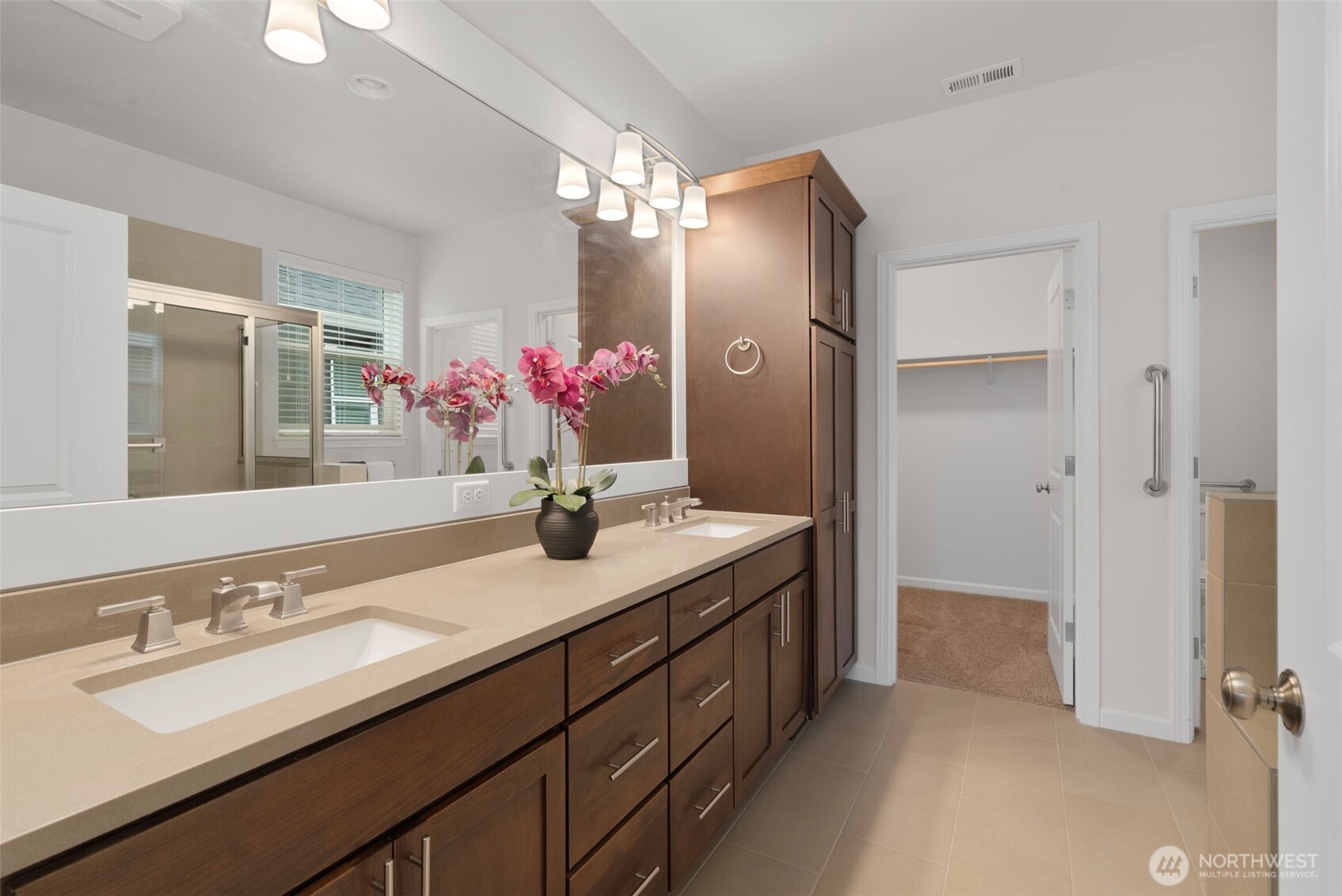 3311 Colville Street Southeast Lacey, WA 98513 - Photo 12 of 40 a bathroom with a granite countertop sink double vanity and a mirror