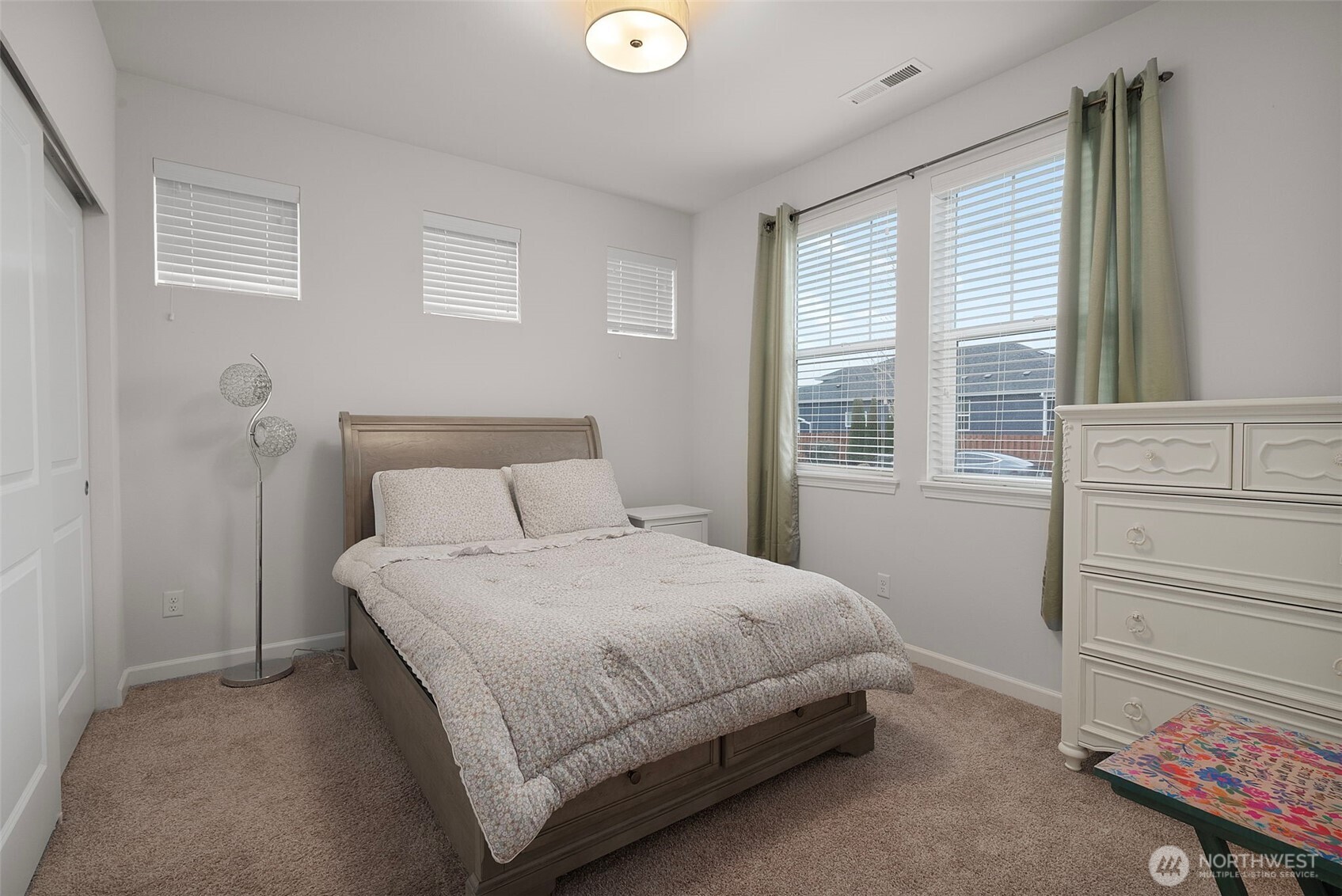 3311 Colville Street Southeast Lacey, WA 98513 - Photo 15 of 40 a bedroom with a bed and a window