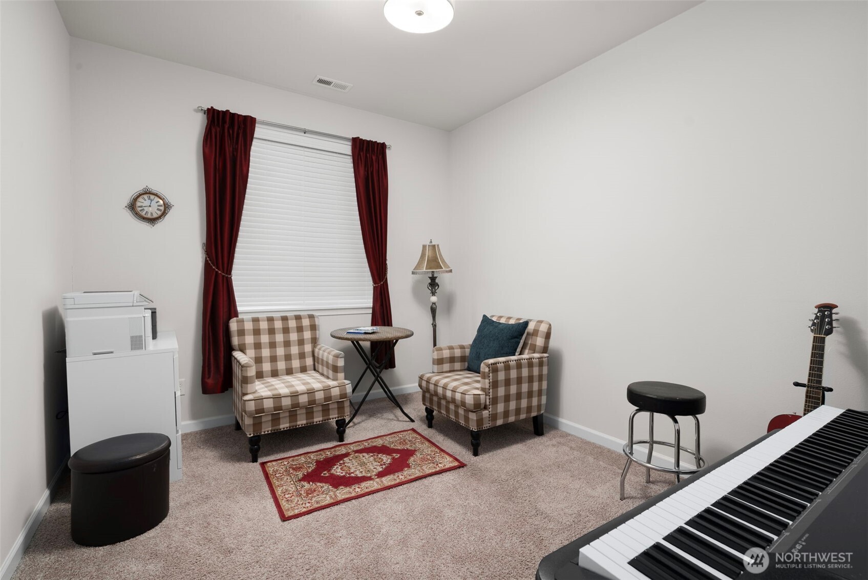 3311 Colville Street Southeast Lacey, WA 98513 - Photo 17 of 40 a living room with furniture and a window