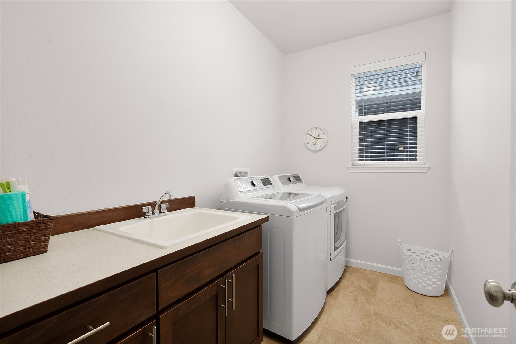 3311 Colville Street Southeast Lacey, WA 98513 - Photo 18 of 40 a utility room with a sink washer and dryer