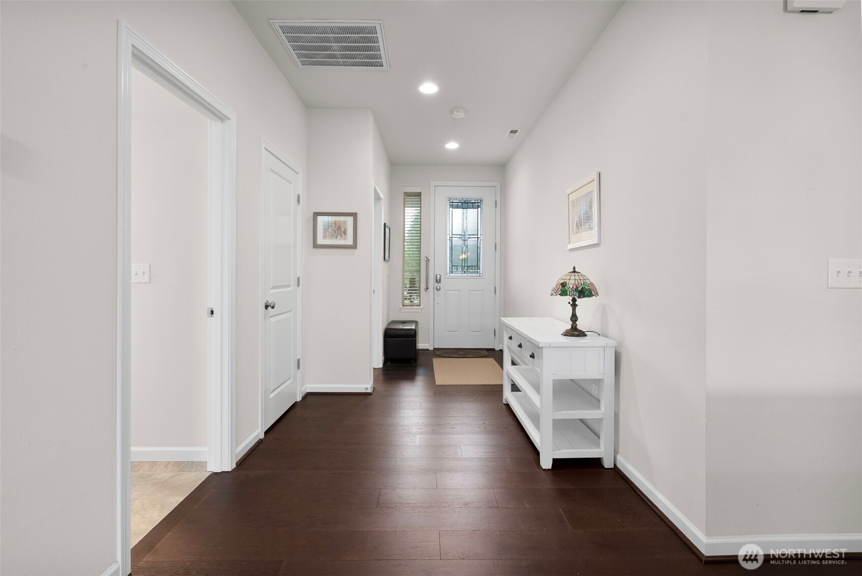 3311 Colville Street Southeast Lacey, WA 98513 - Photo 22 of 40 a view of entryway with livingroom and hardwood floor