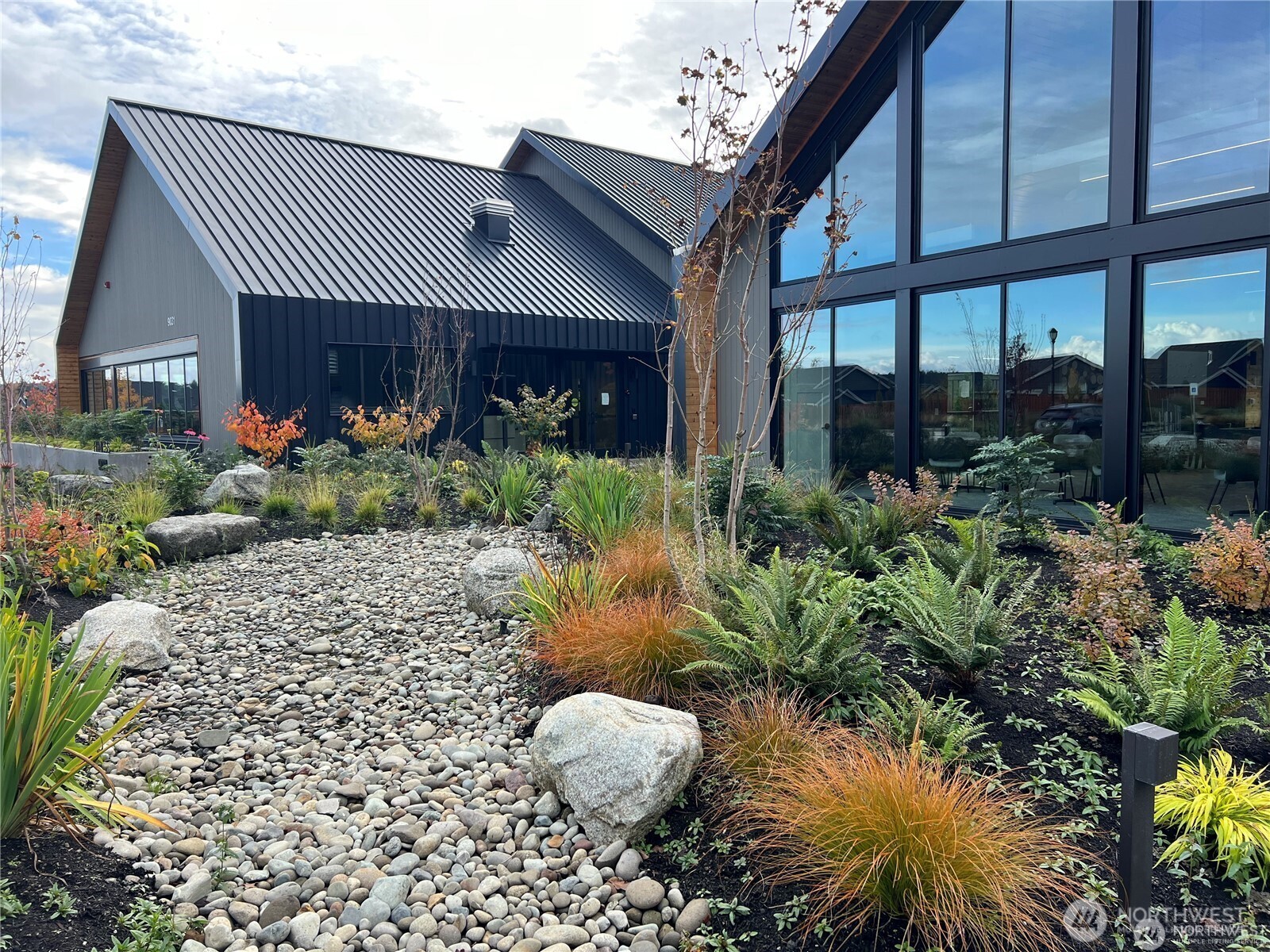 3311 Colville Street Southeast Lacey, WA 98513 - Photo 25 of 40 a front view of a house with garden