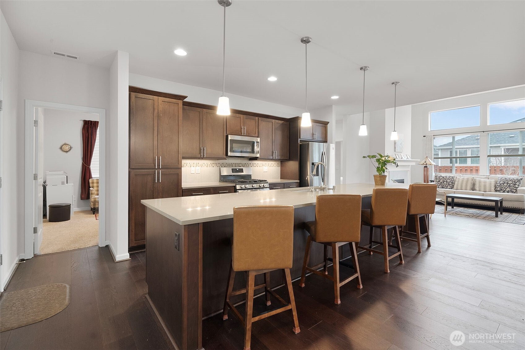 3311 Colville Street Southeast Lacey, WA 98513 - Photo 5 of 40 a large kitchen with a table and chairs