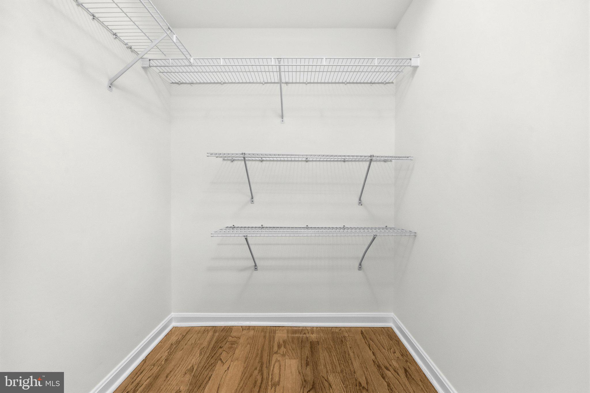 635 Waterloo Road, Unit 222 Warrenton, VA 20186 - Photo 21 of 28 a view of a room with racks on the wall