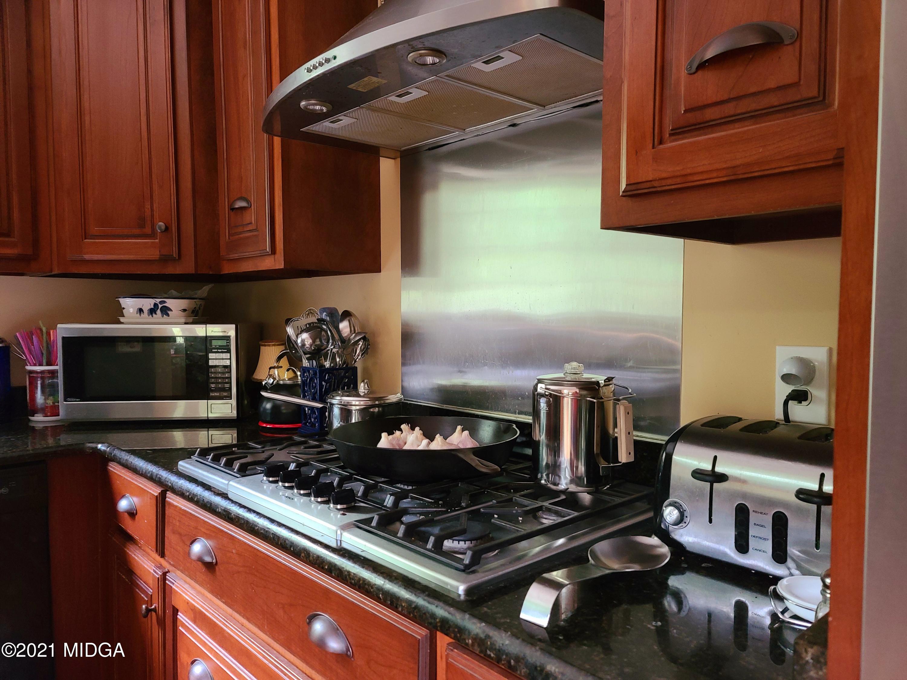 464 Loblolly Lane Macon, GA 31220 - Photo 12 of 48 a kitchen with an oven and cabinets