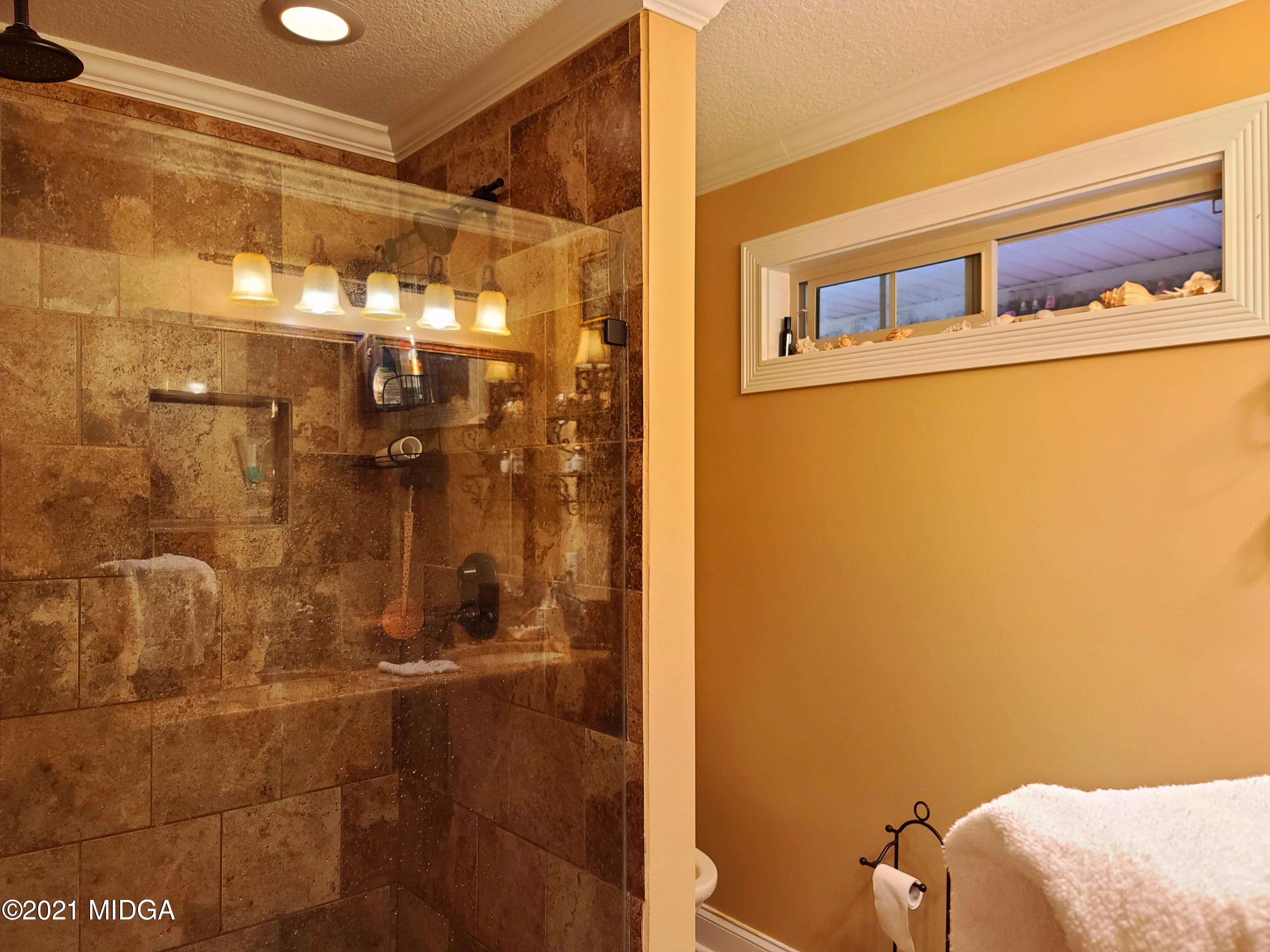 464 Loblolly Lane Macon, GA 31220 - Photo 23 of 48 a bathroom with a shower
