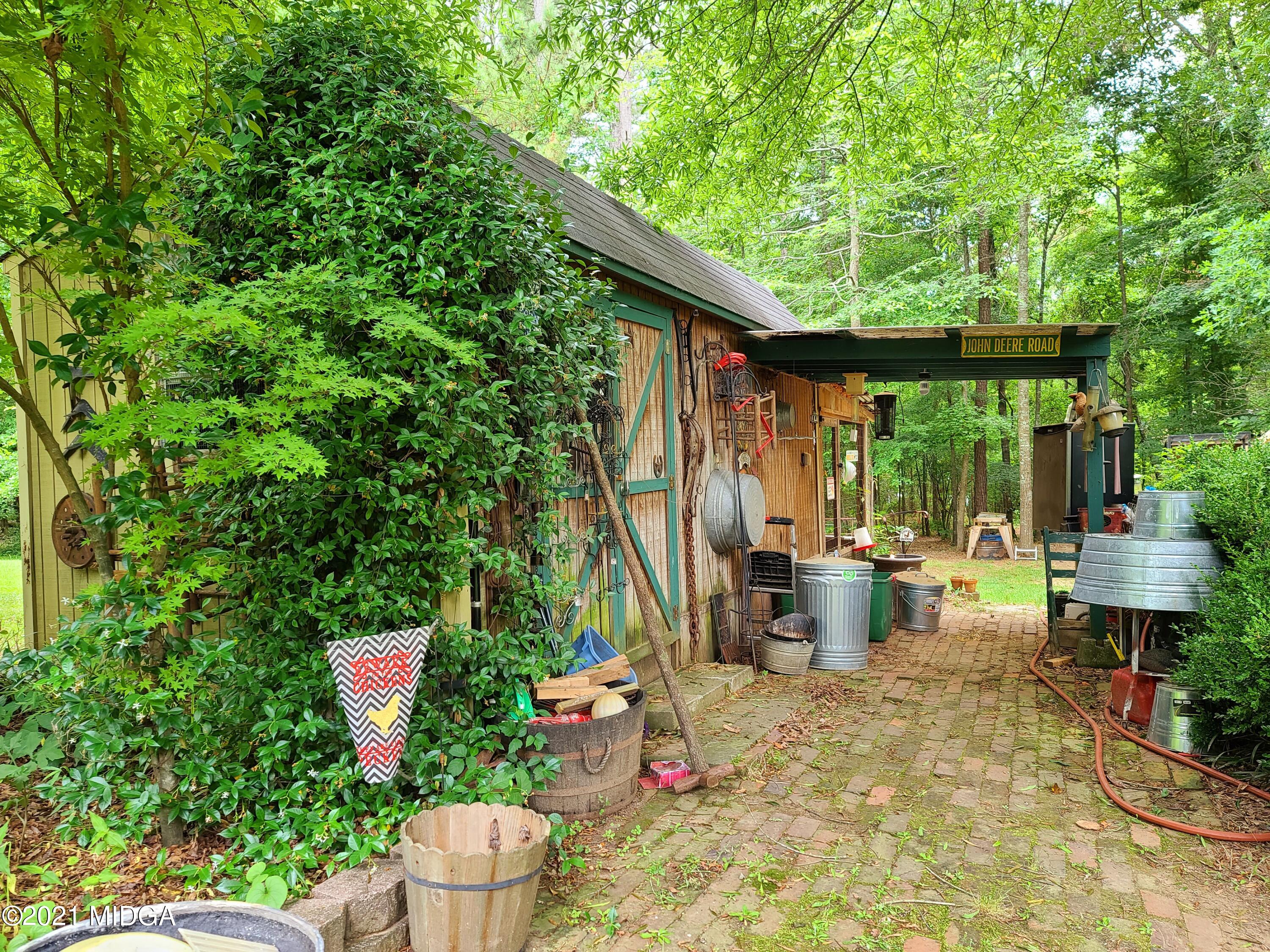 464 Loblolly Lane Macon, GA 31220 - Photo 41 of 48 a backyard of a house with outdoor seating