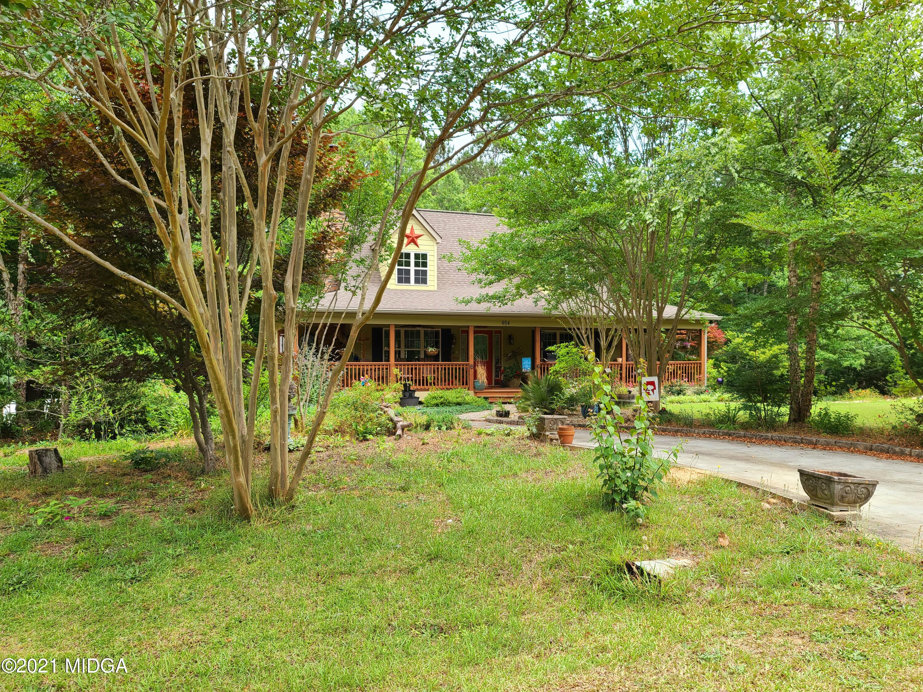 464 Loblolly Lane Macon, GA 31220 - Photo 45 of 48 a front view of a house with yard patio and green space