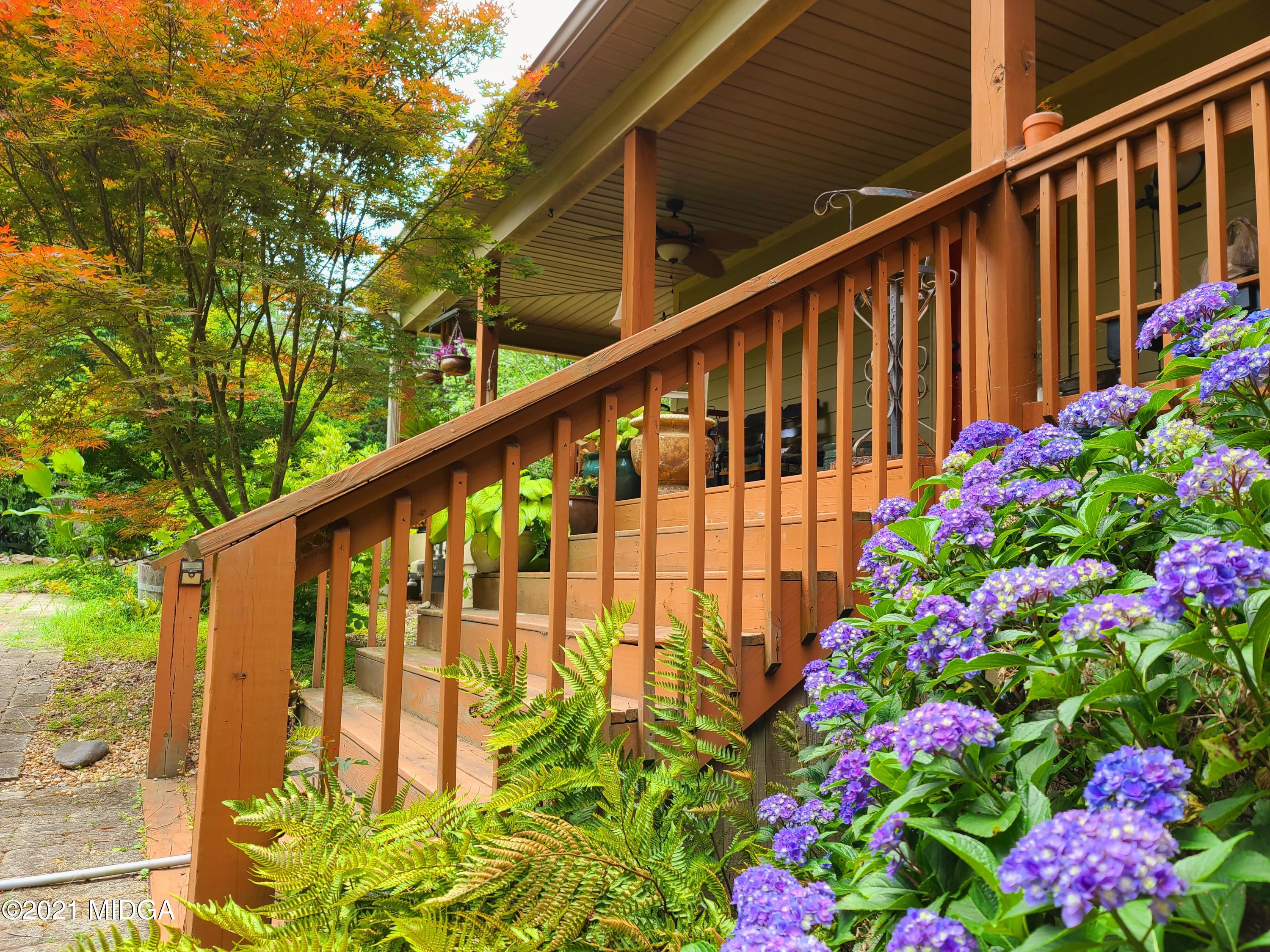 464 Loblolly Lane Macon, GA 31220 - Photo 48 of 48 a view of flower garden with wooden fence