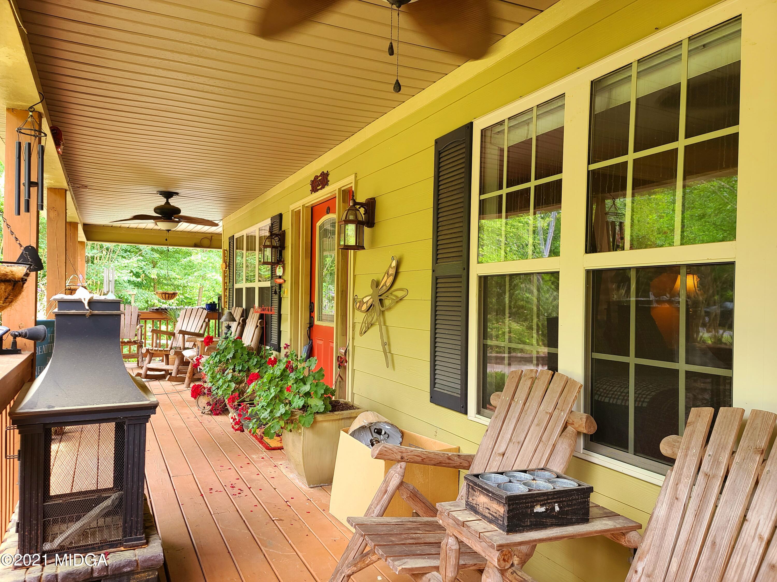 464 Loblolly Lane Macon, GA 31220 - Photo 10 of 48 a view of porch with seating space and potted plants