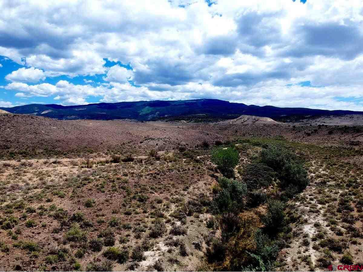 Tbd Bridgeport Road Whitewater, CO 81527 - Photo 5 of 8 a view of a dry yard with wooden fence