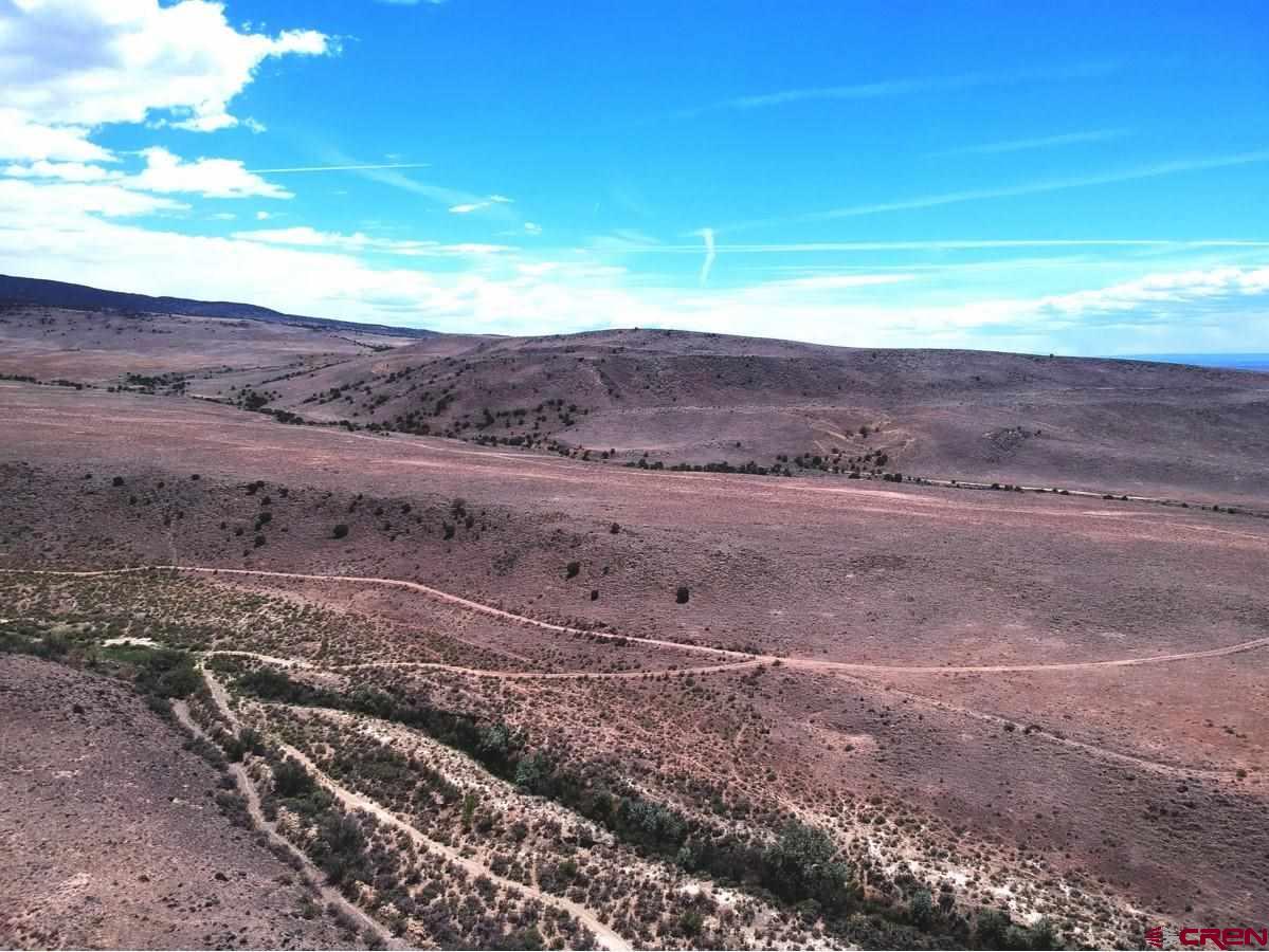 Tbd Bridgeport Road Whitewater, CO 81527 - Photo 6 of 8 a view of a road with an ocean beach