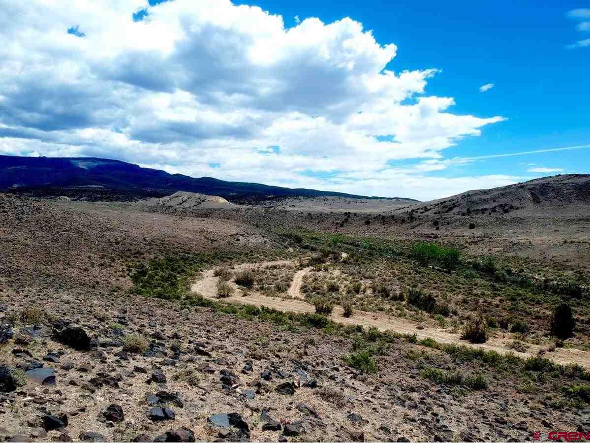 Tbd Bridgeport Road Whitewater, CO 81527 - Photo 7 of 8 a view of a dry yard with wooden fence