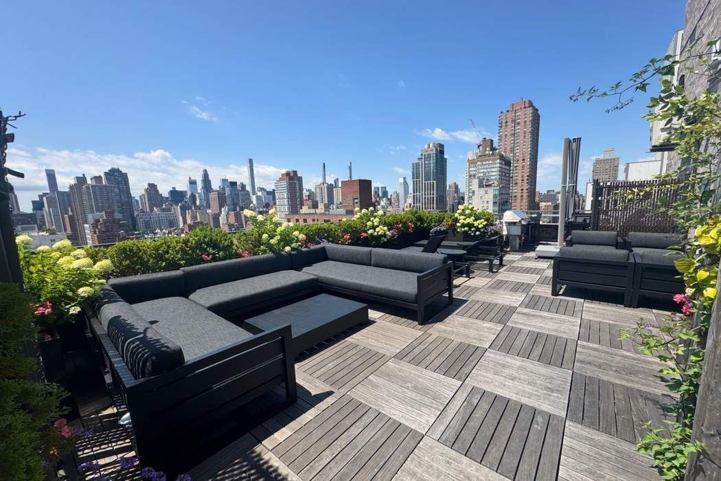 501 East 79th Street, Unit 14E Manhattan, NY 10075 - Photo 15 of 19 a view of a terrace with furniture