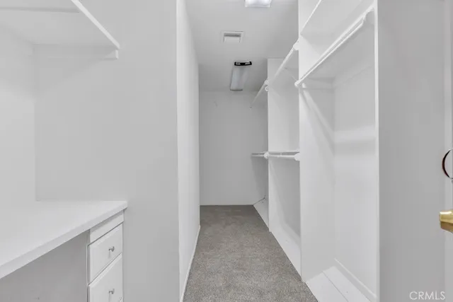 a bathroom with a double vanity sink and a bathtub