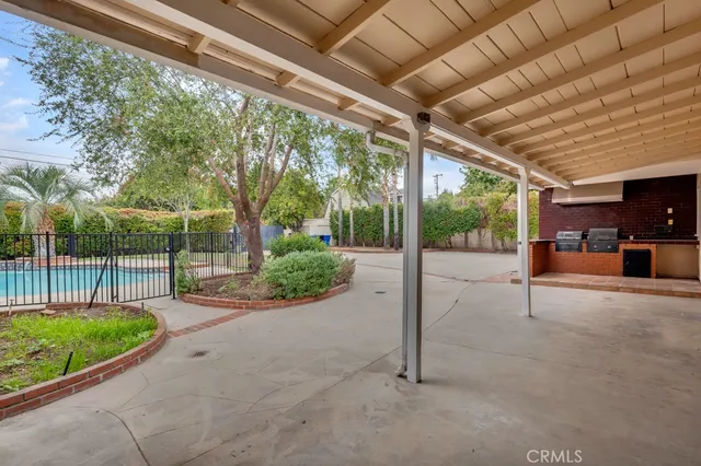 a view of outdoor space and swimming pool
