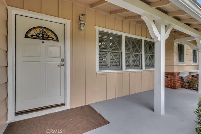 a view of a house with basketball court