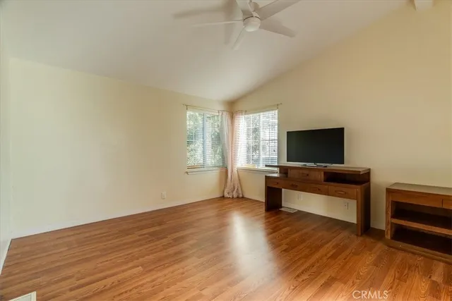 a view of a livingroom with furniture and wooden floor