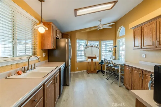 a spacious bathroom with a double vanity sink a mirror and a bathtub