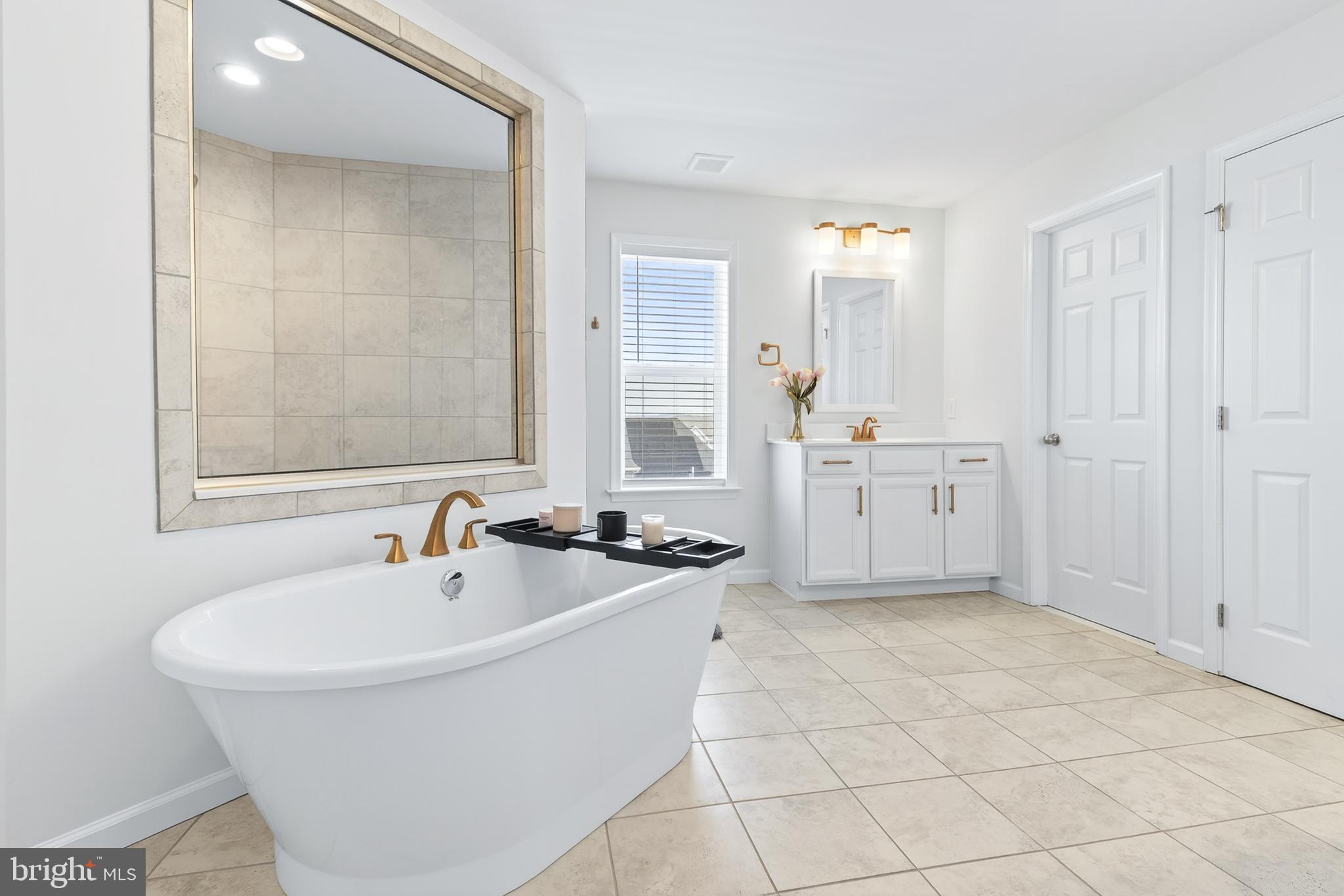 140 Village Road Manchester, PA 17345 - Photo 25 of 51 Elegant primary bathroom with modern fixtures.