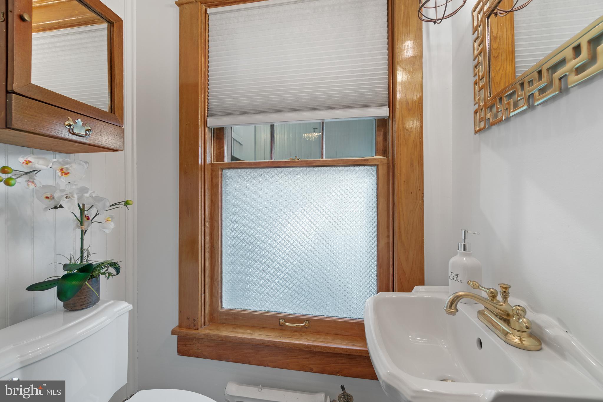 904 Elden Street Herndon, VA 20170 - Photo 16 of 76 Main-level powder room