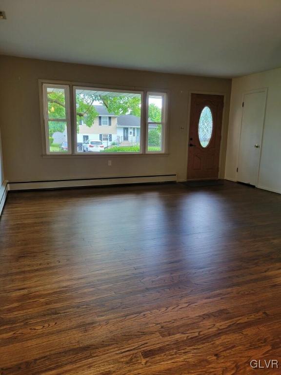 1413 Exeter Road Allentown, PA 18103 - Photo 2 of 16 a view of a room with wooden floor and window