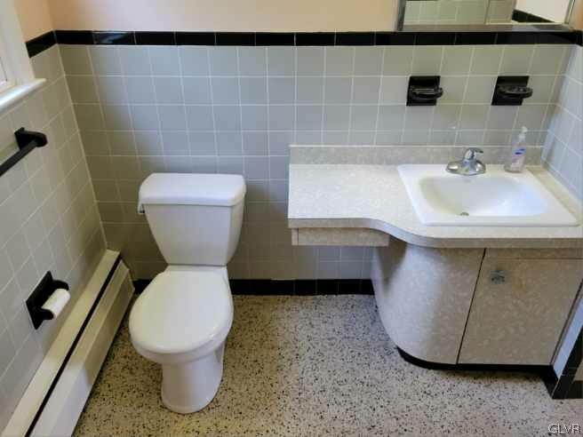 1413 Exeter Road Allentown, PA 18103 - Photo 10 of 16 a bathroom with a toilet and a sink