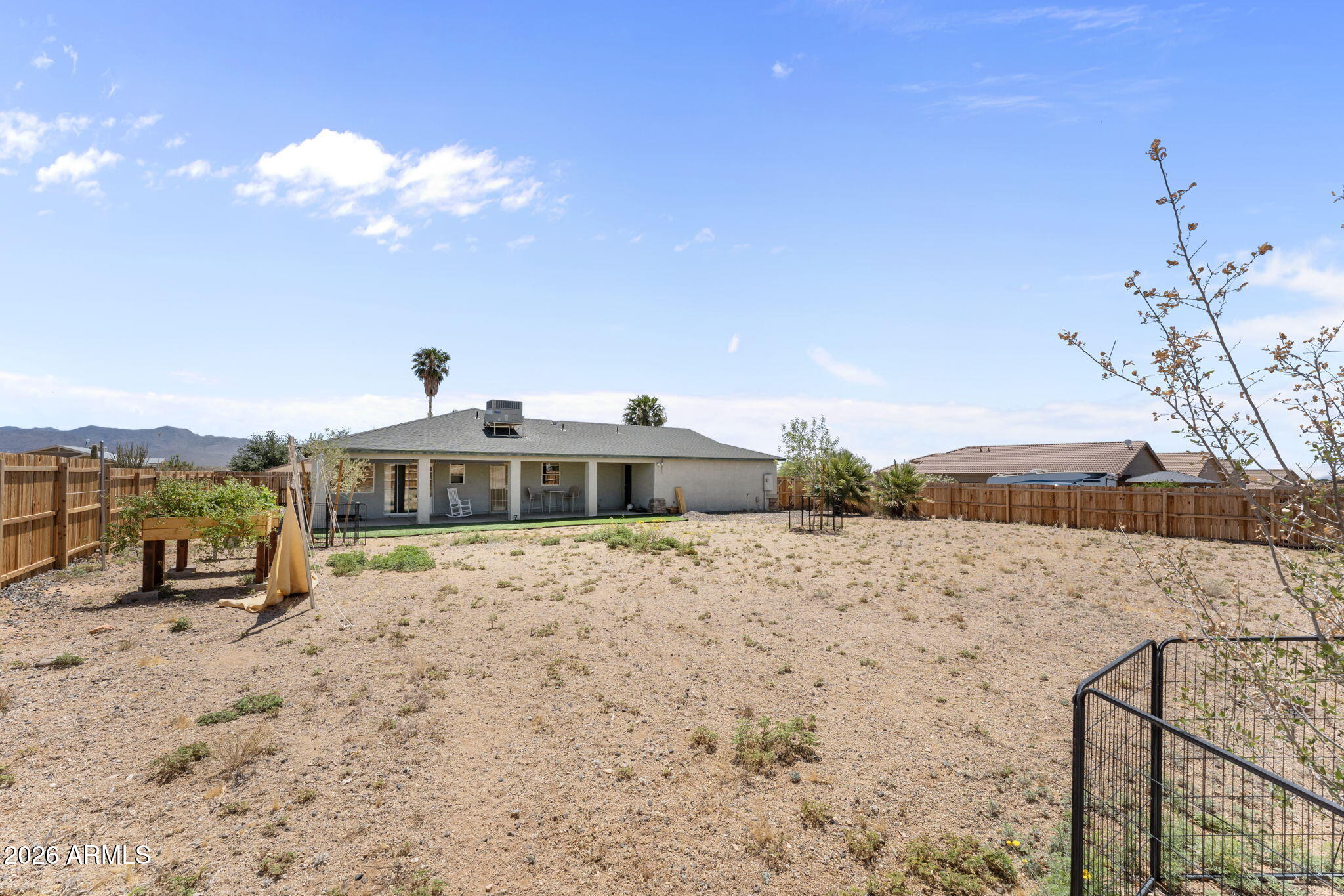 27144 Bennett Way Congress, AZ 85332 - Photo 23 of 33 a view of a house with a snow in the yard