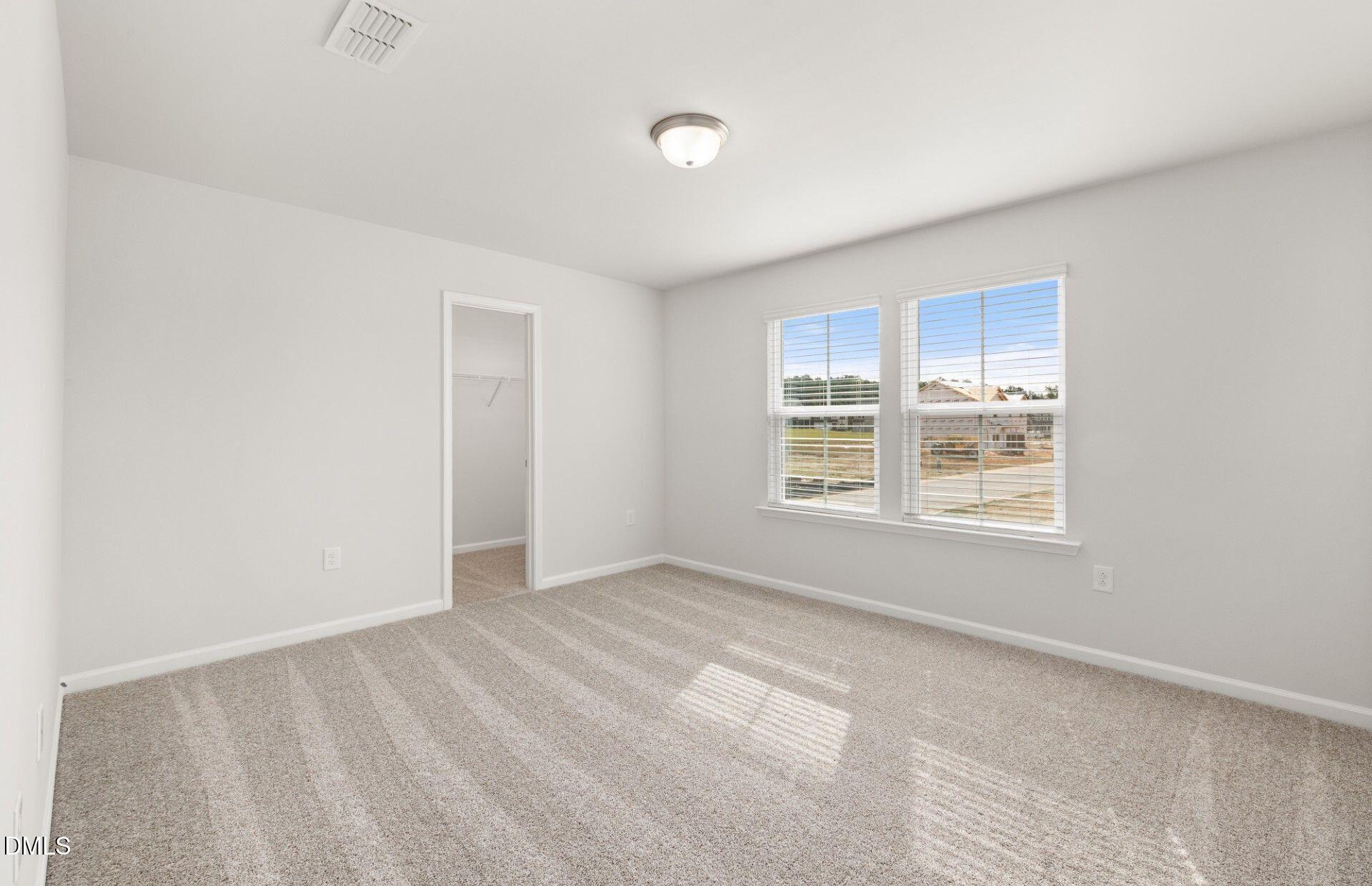 637 Fosterton Cottage Way Raleigh, NC 27603 - Photo 16 of 31 a view of an empty room with a window