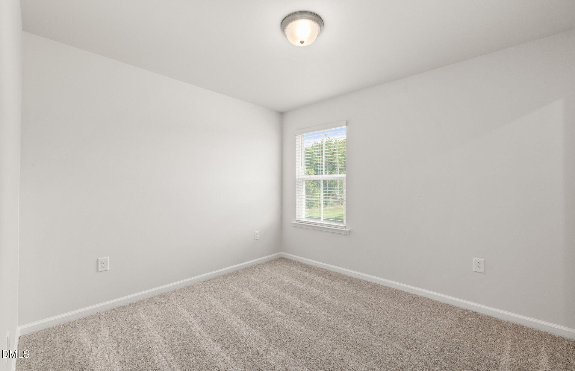 637 Fosterton Cottage Way Raleigh, NC 27603 - Photo 17 of 31 an empty room with a window