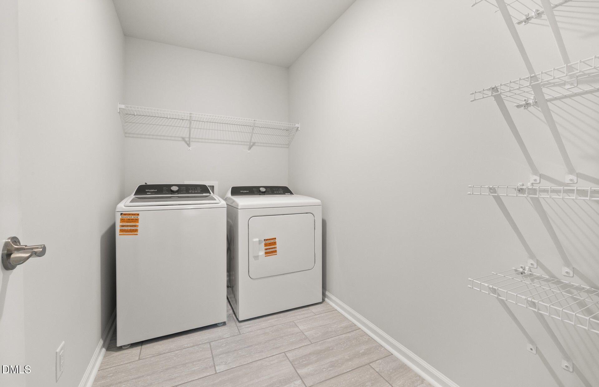 637 Fosterton Cottage Way Raleigh, NC 27603 - Photo 21 of 31 a utility room with dryer and washer