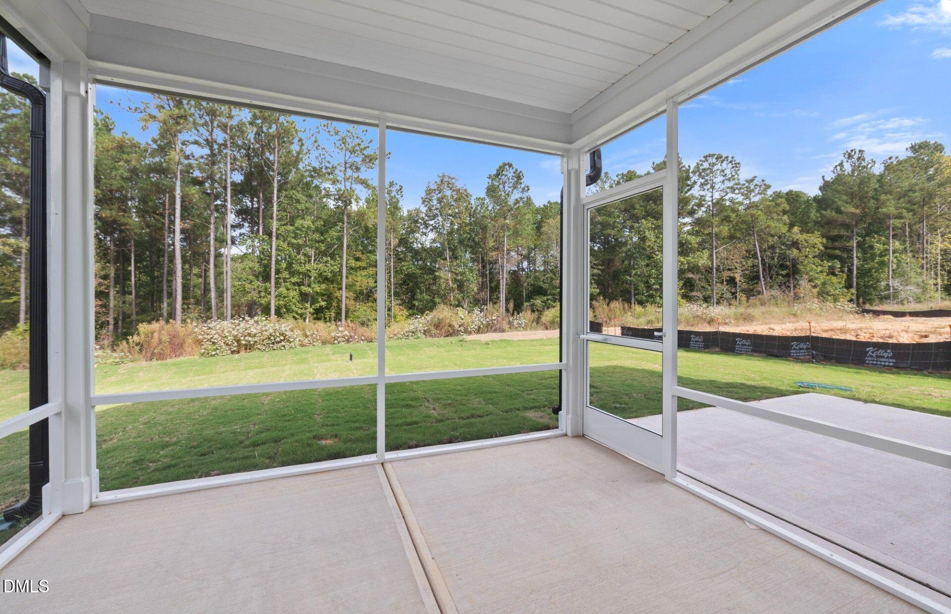 637 Fosterton Cottage Way Raleigh, NC 27603 - Photo 22 of 31 a view of a house with a yard and porch