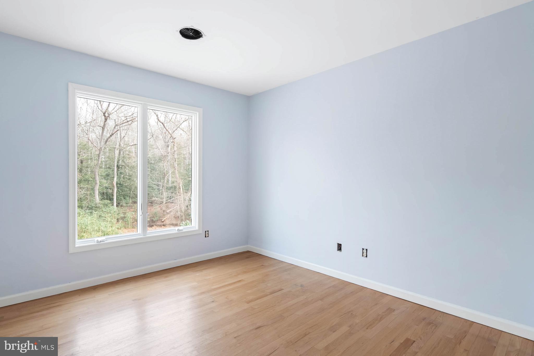 18885 Sand Hill Road Milton, DE 19968 - Photo 30 of 46 an empty room with a window