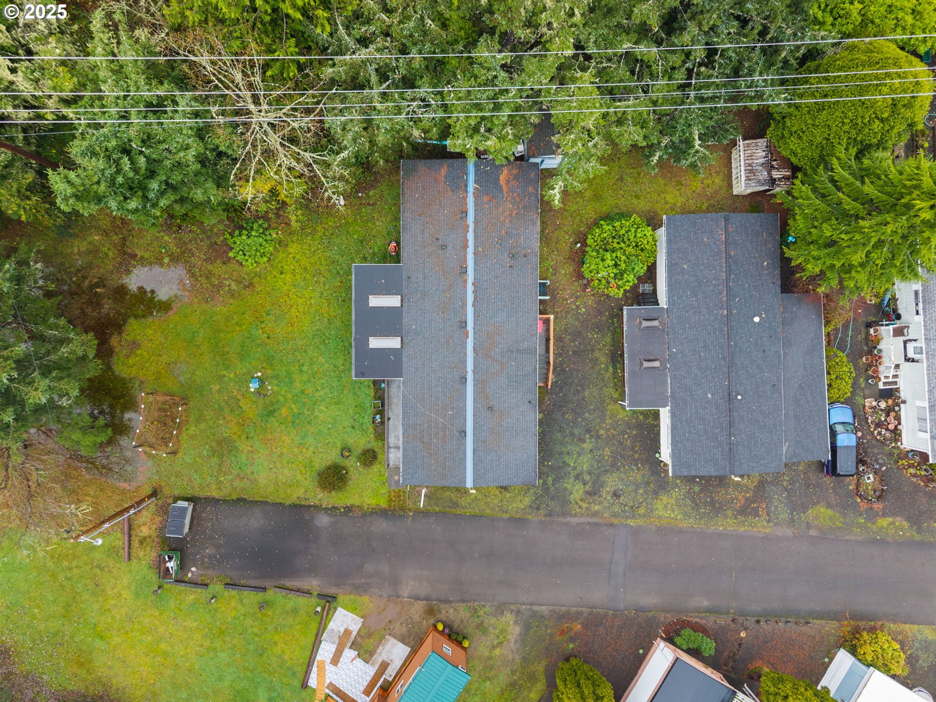 2657 North Highway 101, Unit 6 Seaside, OR 97138 - Photo 12 of 13 an aerial view of a house with a yard