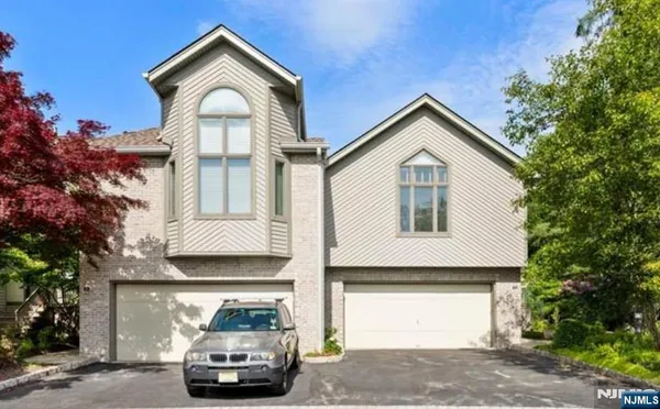 a car parked in front of a house