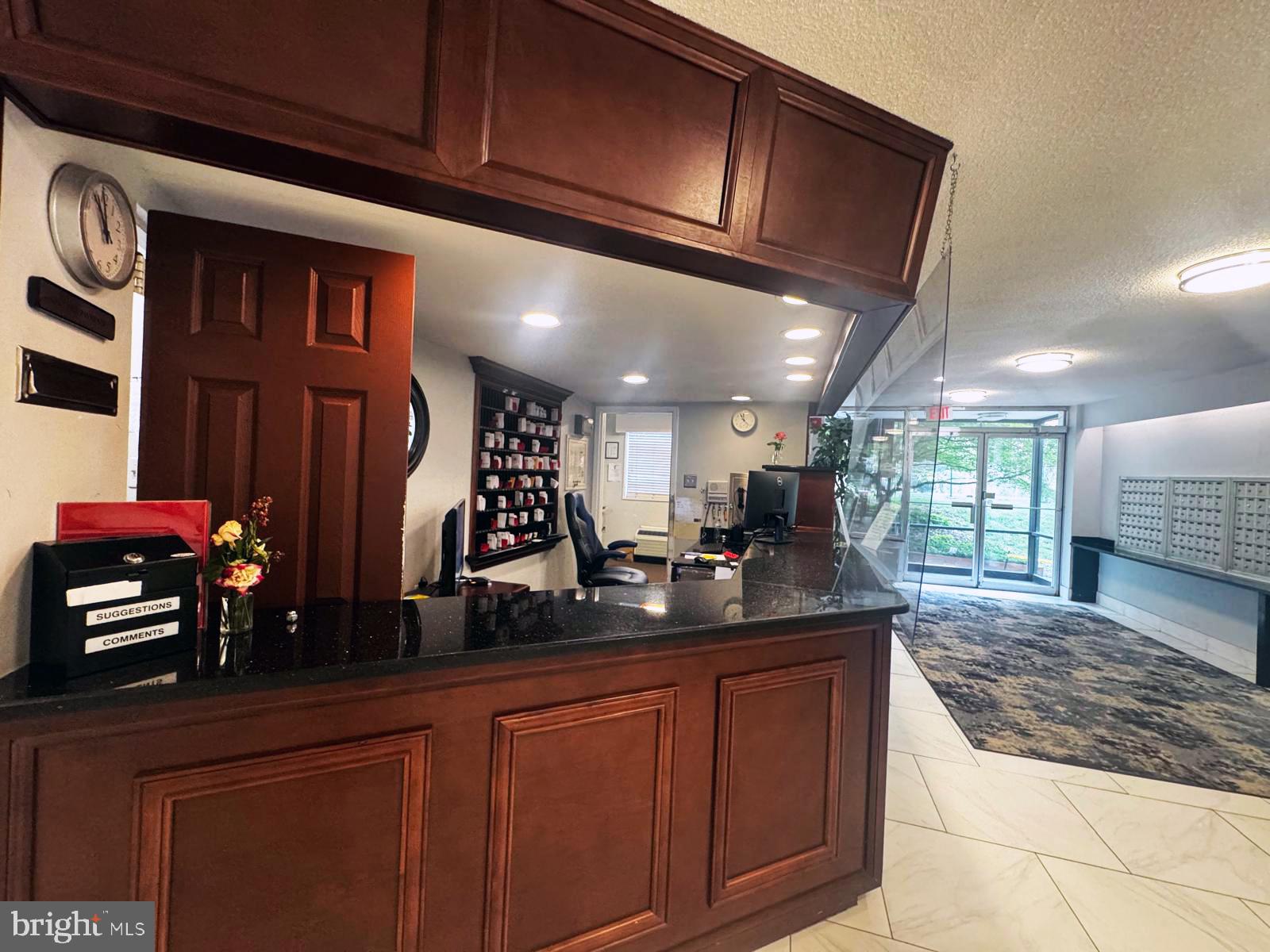 2059 Huntington Avenue, Unit 1101 Alexandria, VA 22303 - Photo 27 of 35 a kitchen with stainless steel appliances granite countertop a sink stove and cabinets