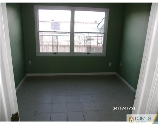 236 Edpas Road New Brunswick, NJ 08901 - Photo 12 of 15 a view of empty room with window