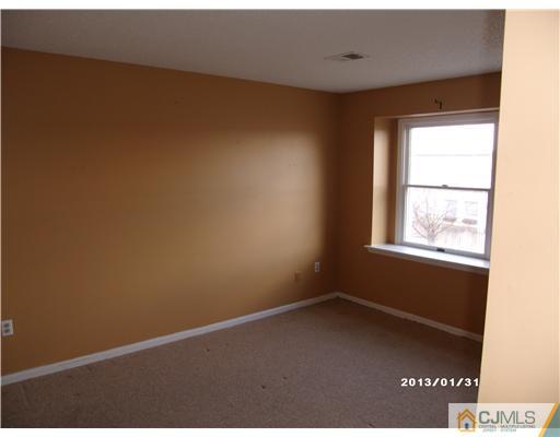 236 Edpas Road New Brunswick, NJ 08901 - Photo 10 of 15 a view of an empty room with a window