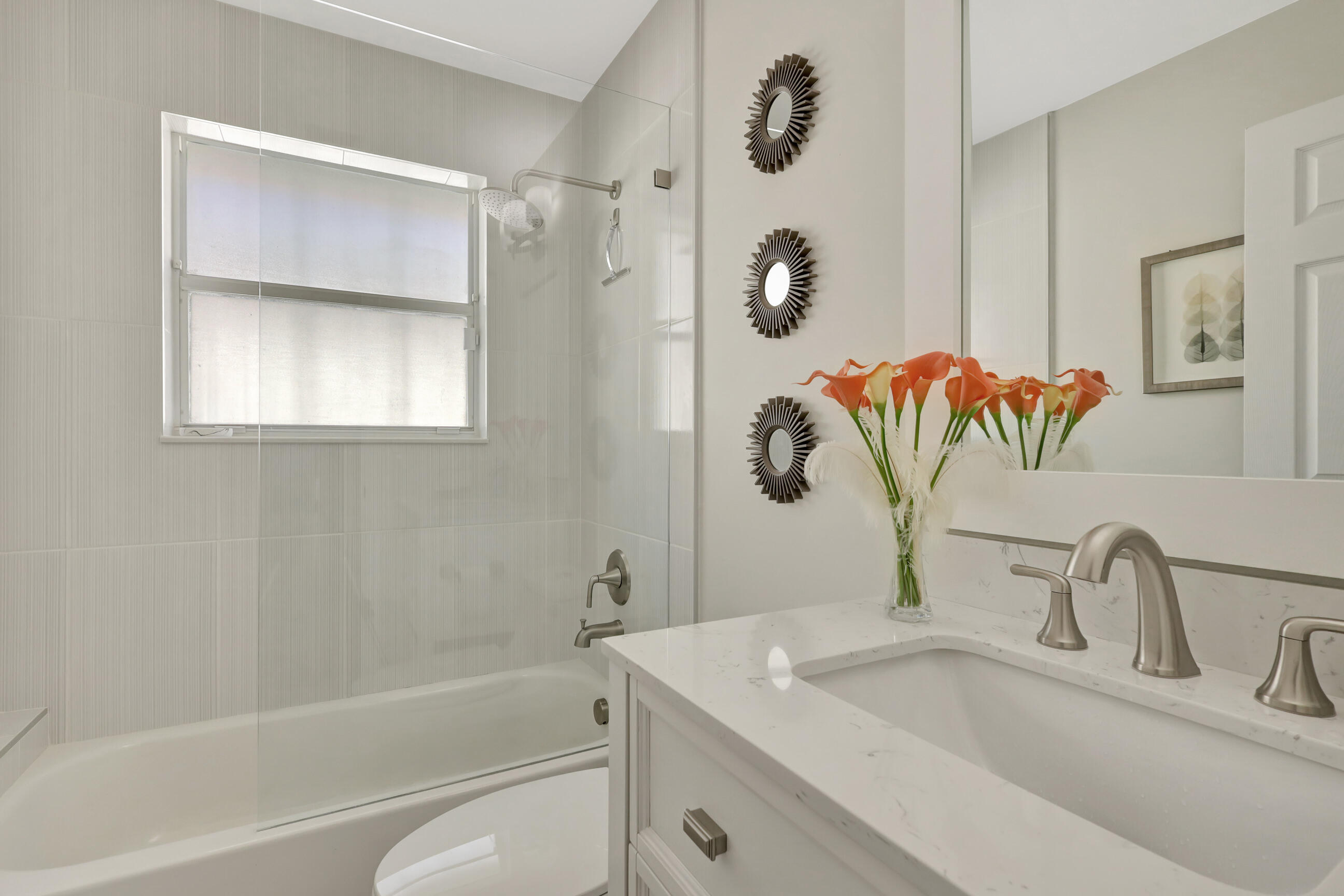 12204 Sunset Point Circle Wellington, FL 33414 - Photo 24 of 40 a bathroom with a sink and a bathtub